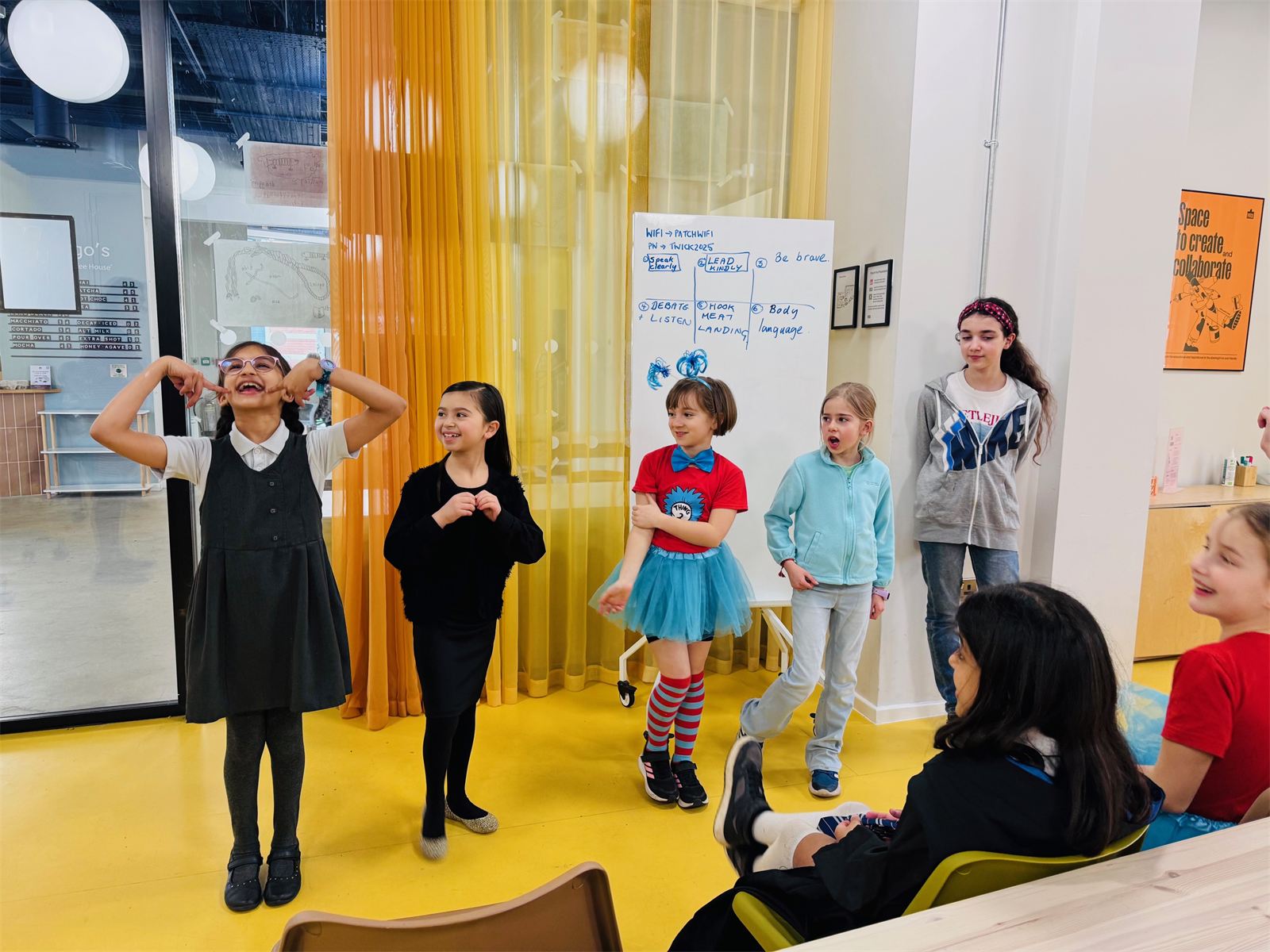 Children speaking in front of the group at a Rise to Lead session